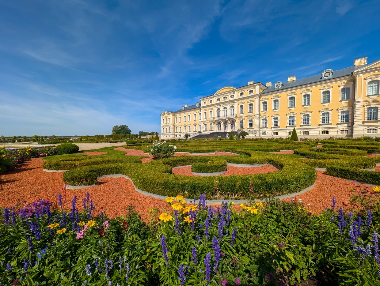 Baroque formal garden with patterned box hedges in front of Rundāle Palace
