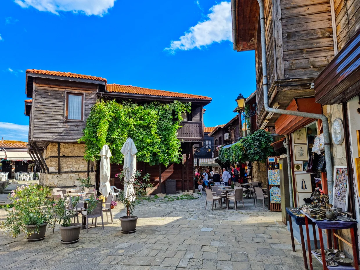 Wooden houses and outdoor cafes in Nessebar's Old Town