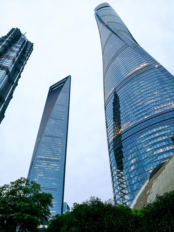 Shanghai supertall trio seen from below with Shanghai Tower, SWFC, and Jin Mao Tower