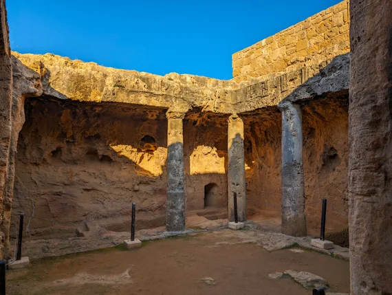 Another angle of the columned tomb chamber in warm evening light
