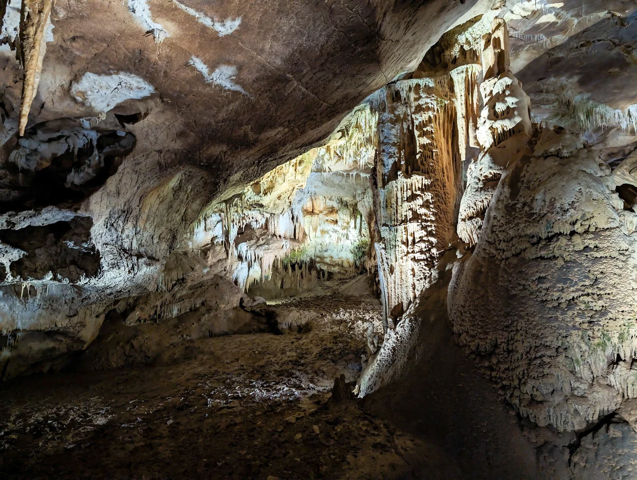 Prometheus Cave interior, stalactites lit from below