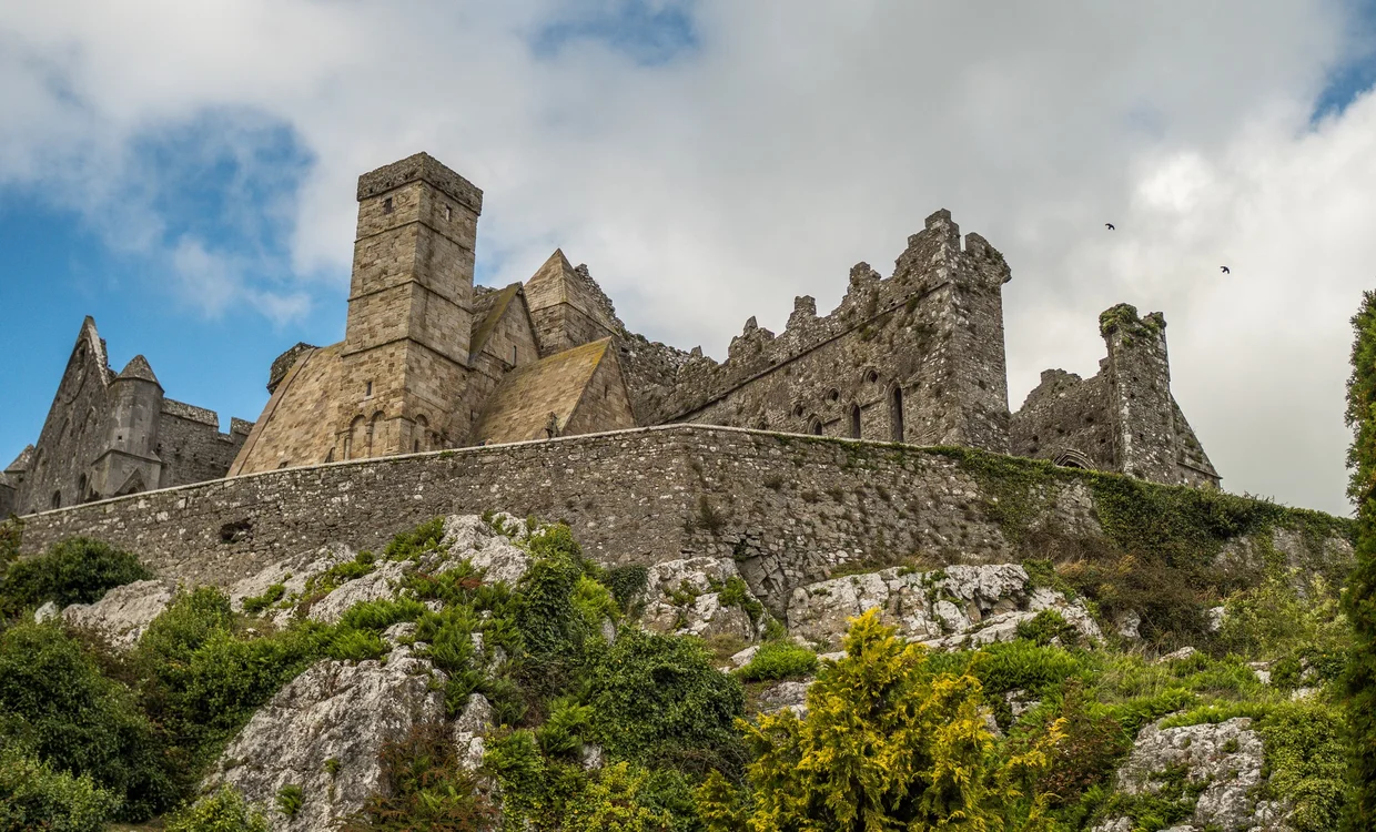 Rock of Cashel from below, the fortress walls rising from the hilltop