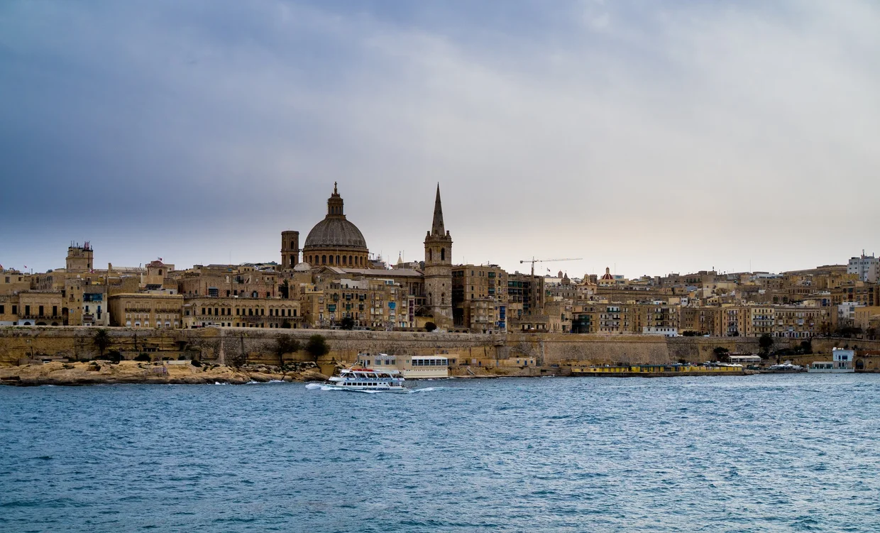 Valletta skyline from the water with the dome of the Basilica and the cathedral spire
