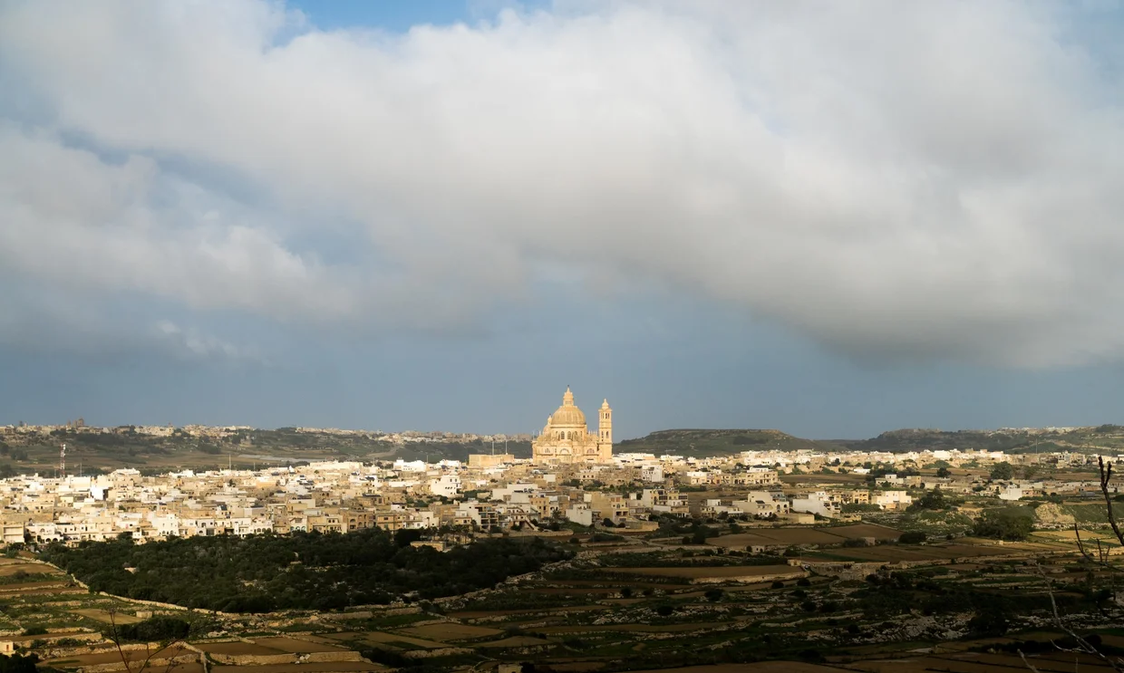 Panoramic view of Victoria with a large church dome dominating the skyline