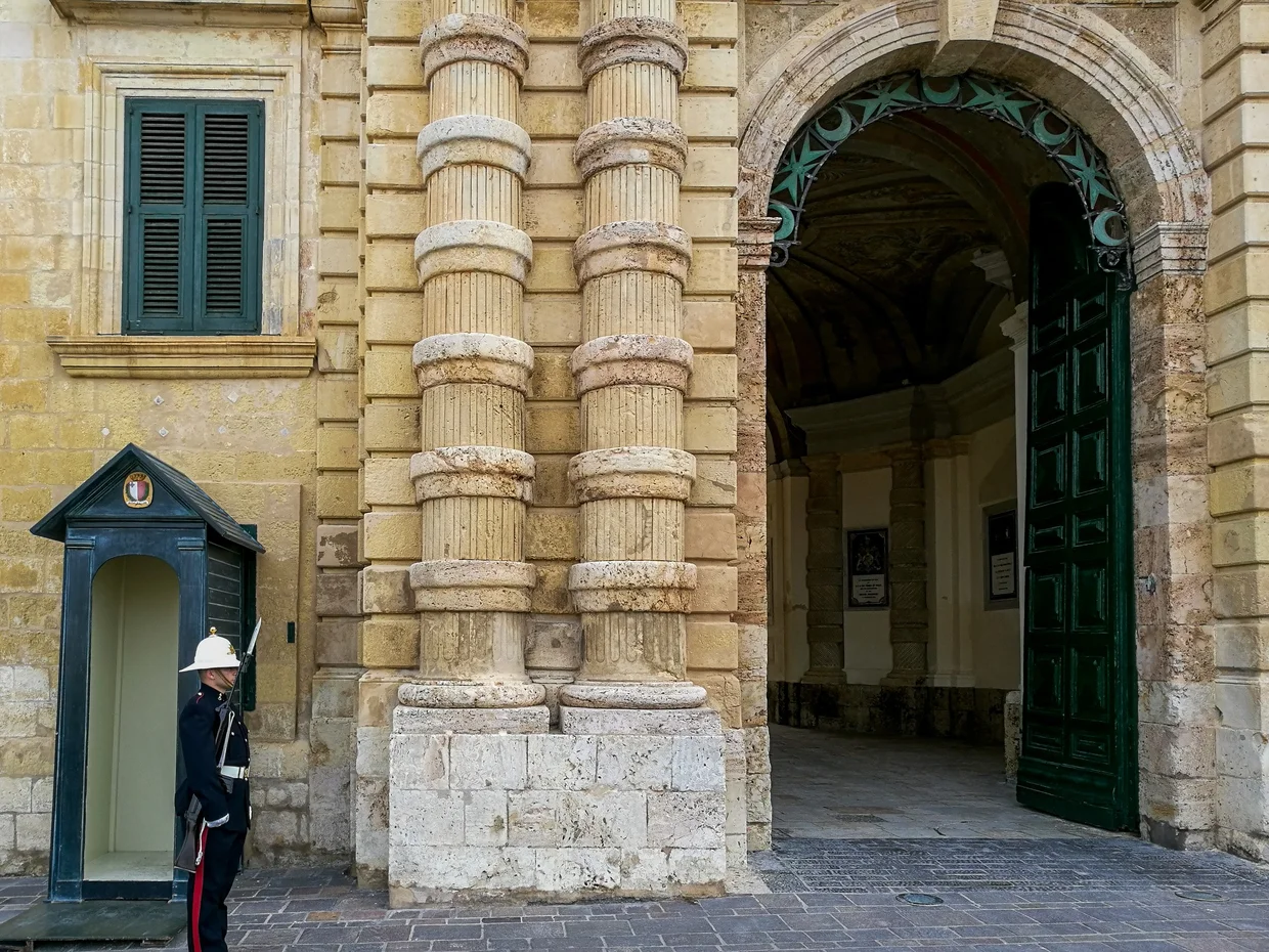 Guard in ceremonial uniform at the Grandmaster's Palace