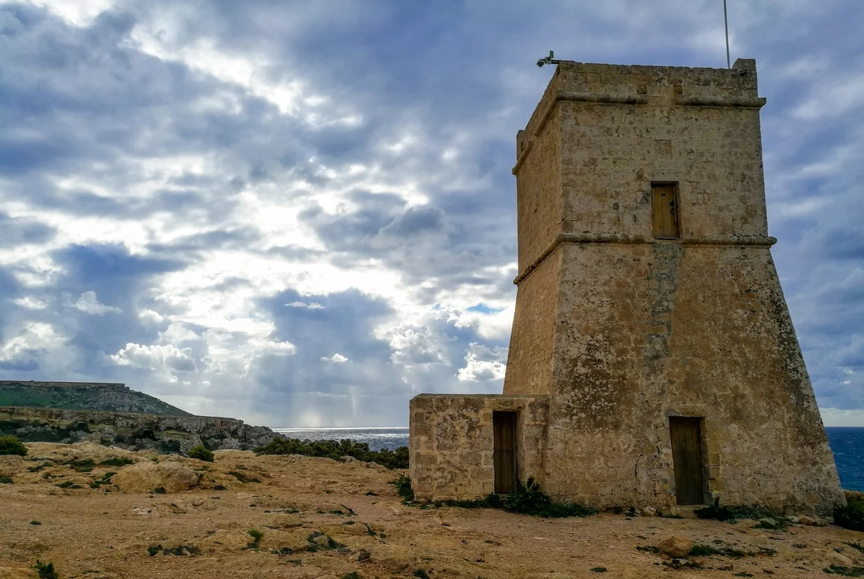Coastal watchtower standing alone on barren clifftop