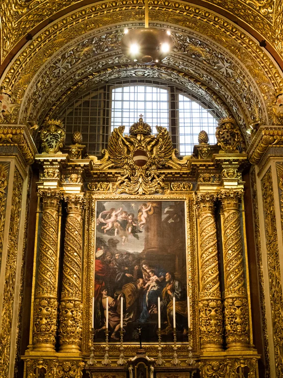 Side chapel with gilded altar and large painting
