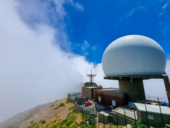 Radar dome at the Pico do Arieiro summit, half-swallowed by clouds