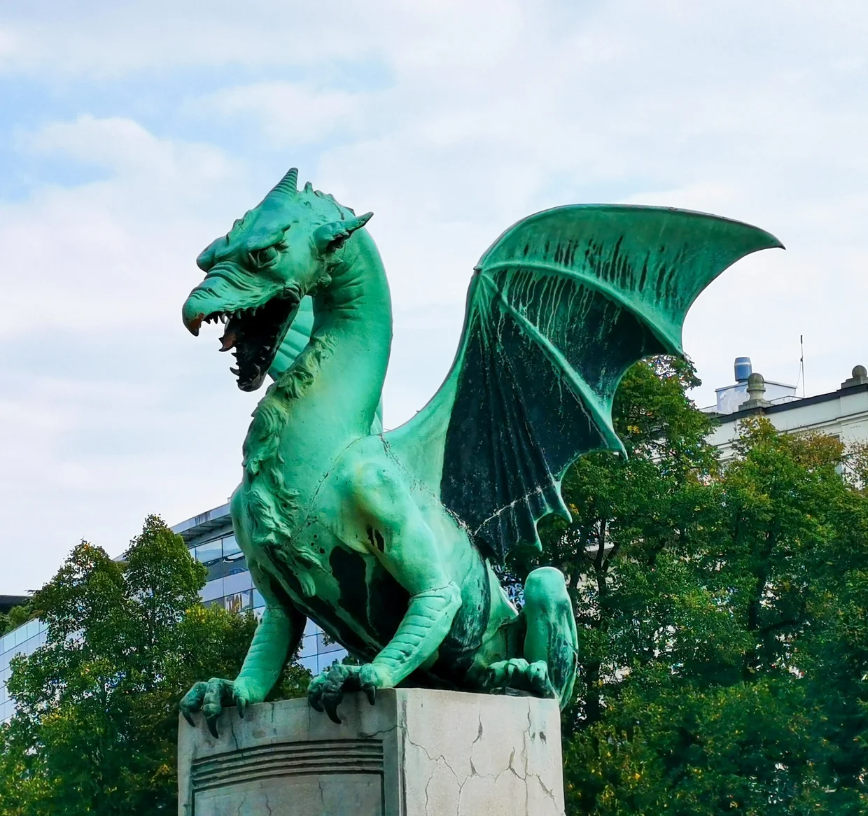Green dragon statue close-up on the Dragon Bridge