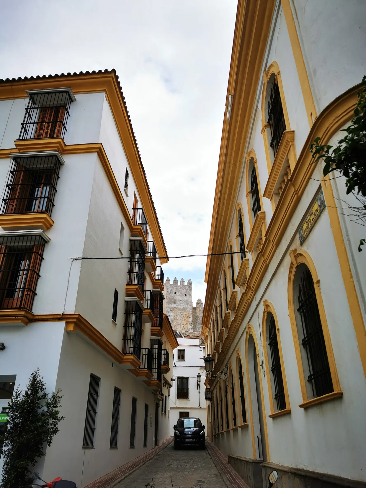 White and yellow Andalusian street in a pueblo blanco