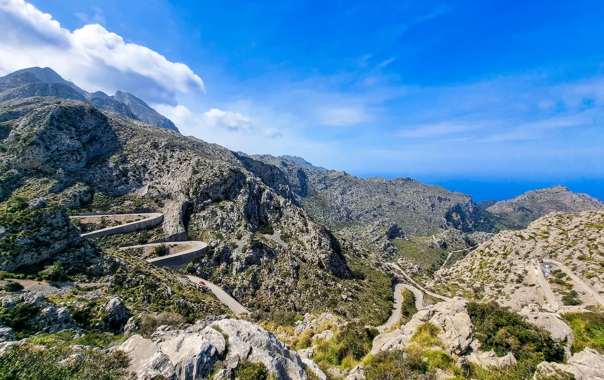 Sa Calobra road from a different angle, hairpin turns visible through the valley
