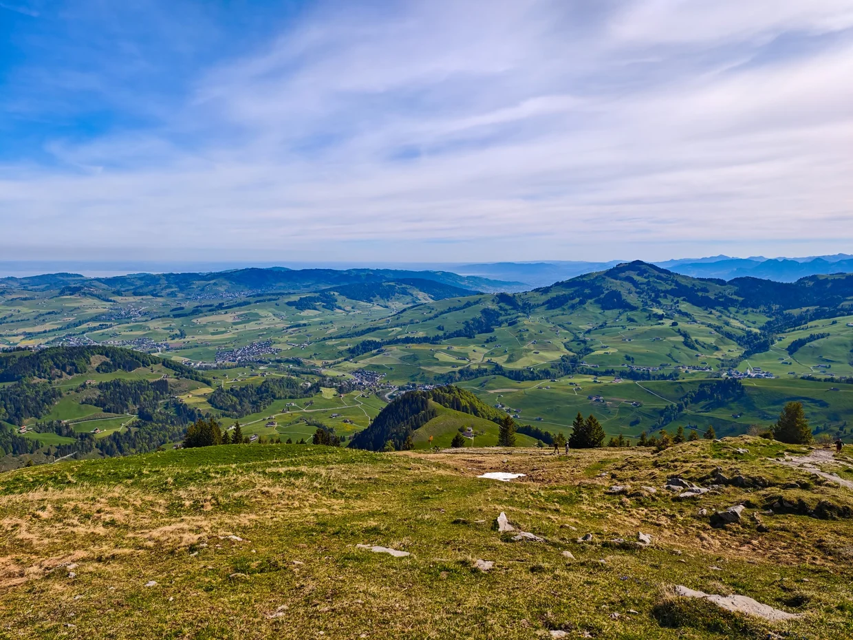 Panoramic view from Ebenalp's summit looking out over the Appenzell hills