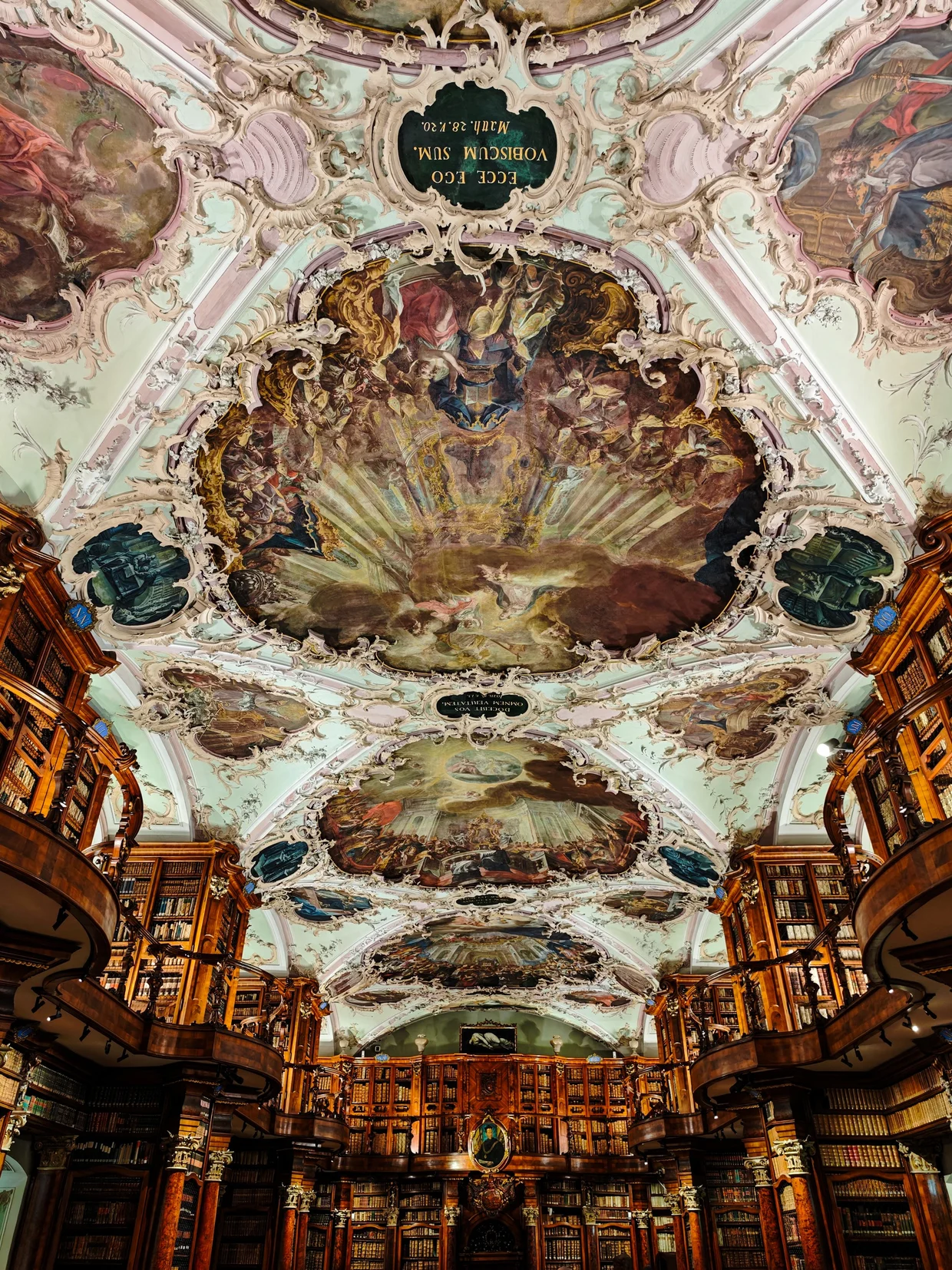 The Rococo ceiling fresco above the central nave of the library