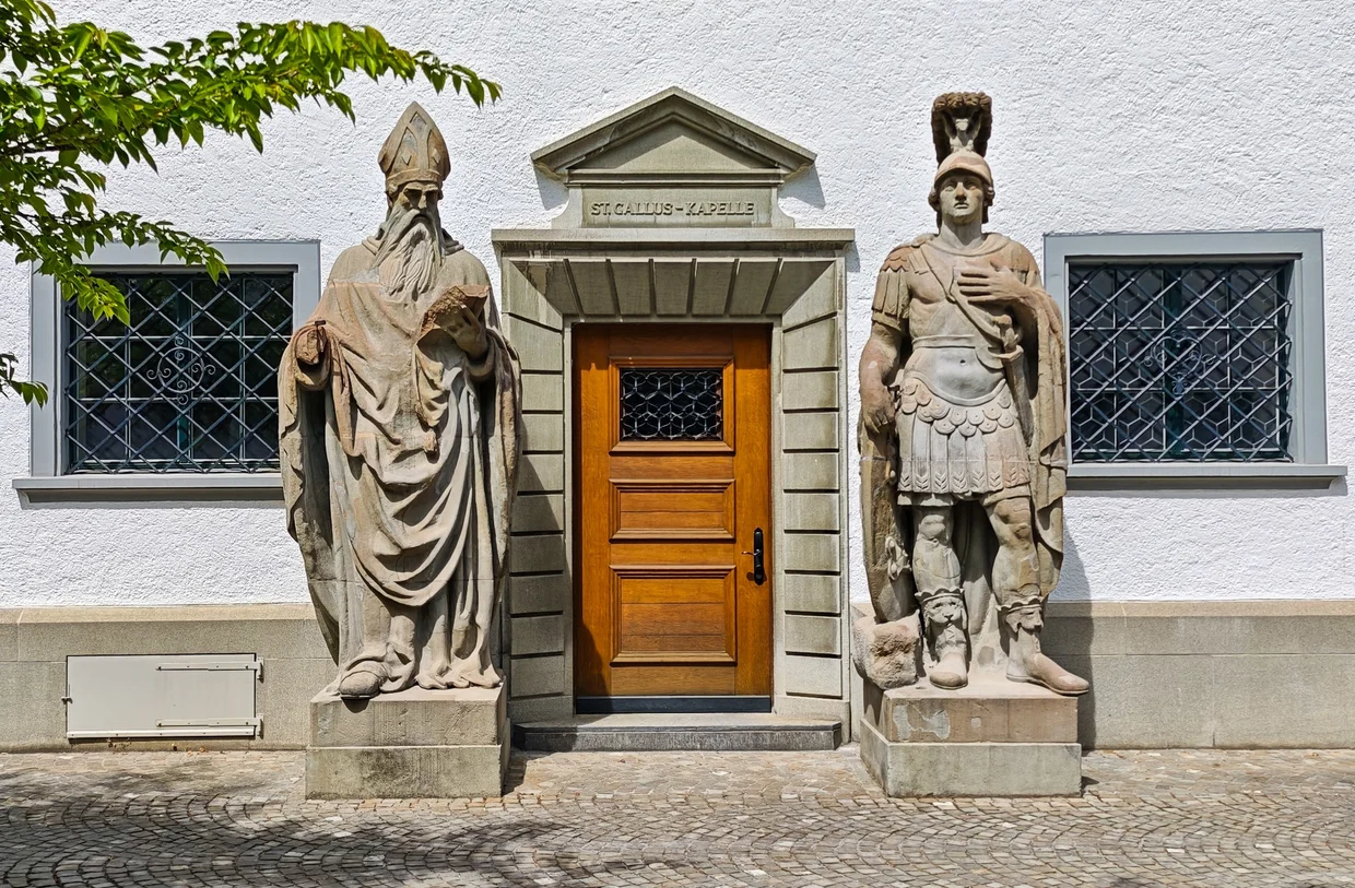 The St. Gallus chapel doorway flanked by two stone statues