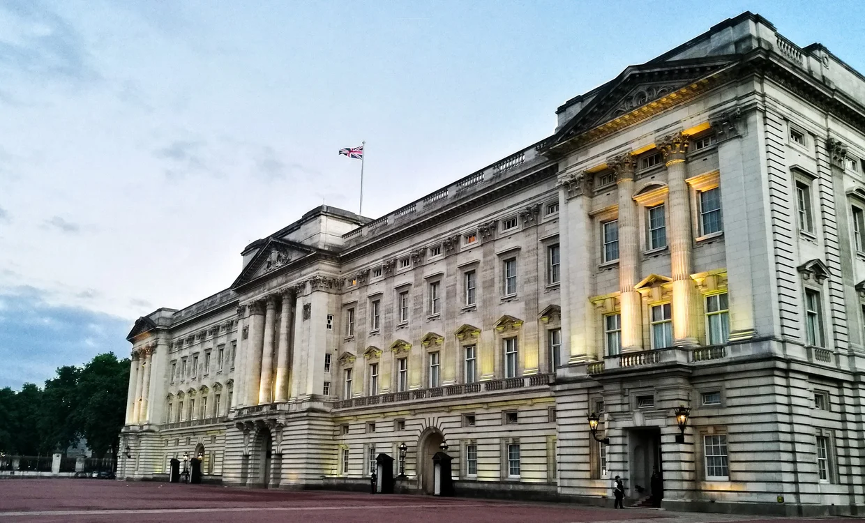 Buckingham Palace glowing at dusk