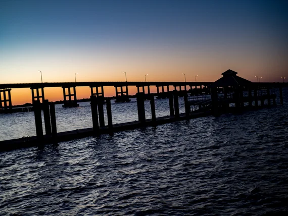 Pier silhouette at sunset