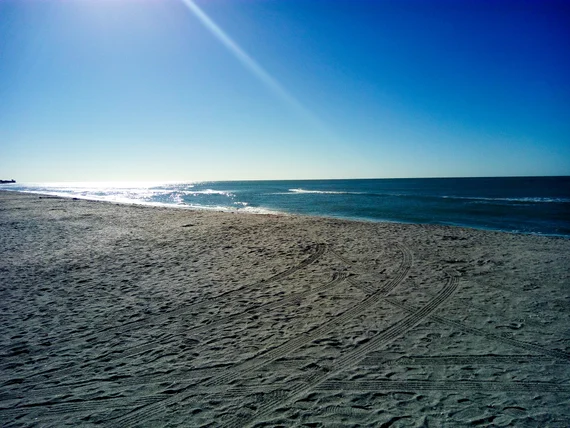 Wide sandy beach on a sunny day